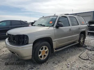 2003 GMC Yukon Denali z VIN 1GKEK63U23J247931, wystawiony jako Copart lot #52723975 z przebiegiem Nie podano mil oraz Tytuł czysty. Historia ofert i sprzedaży dostępna na DreamBid. Obrazek 1.