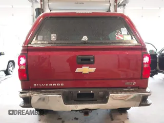 2014 Chevrolet Silverado 1500 LT with VIN 3GCUKREC9EG358476, listed as a IAAI auction lot 41866756 with 210,880 mi miles and . Bid and sale history available at DreamBid. Image 16.