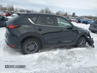 2019 Mazda CX-5 Touring with VIN JM3KFBCM0K0607933, listed as a Copart auction lot 46260815 with 64,349 mi miles and Salvage Title. Bid and sale history available at carsss.com. Image 3.