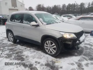 2011 Volkswagen Tiguan SE with VIN WVGBV7AX2BW513647, listed as a IAAI auction lot 41660772 with 86,042 mi miles and . Bid and sale history available at DreamBid. Image 1.