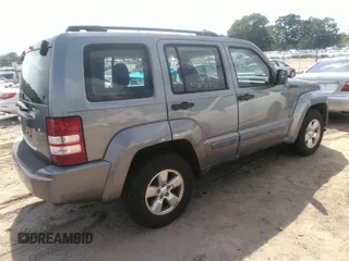 2012 Jeep Liberty Sport with VIN 1C4PJMAKXCW107531, listed as a IAAI auction lot 42155945 with 166,188 mi miles and . Bid and sale history available at carsss.com. Image 4.