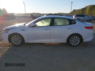 2018 Kia Optima LX with VIN 5XXGT4L32JG265716, listed as a IAAI auction lot 40645411 with 112,305 mi miles and . Bid and sale history available at DreamBid. Image 14.