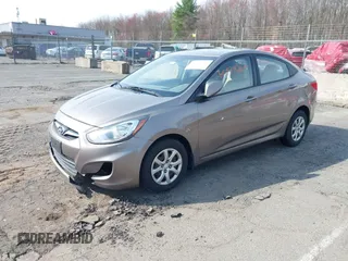 2013 Hyundai Accent GLS with VIN KMHCT4AE1DU314191, listed as a IAAI auction lot 41979265 with 177,944 mi miles. Bid and sale history available at carsss.com. Image 2.