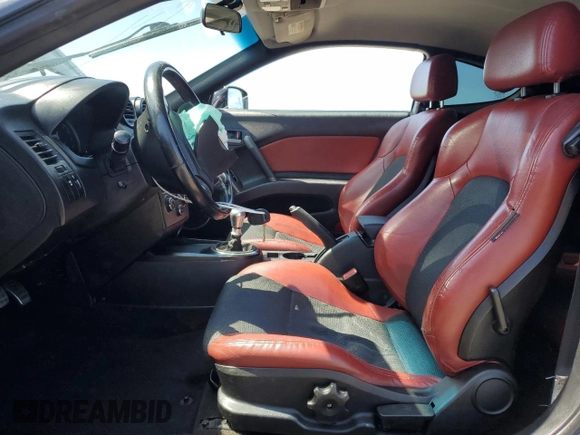 2008 Hyundai Tiburon GT z VIN KMHHN66F18U295838, wystawiony jako Copart lot #51972325 z przebiegiem 147 626 mil mil oraz Szkoda całkowita • Salvage title. Historia ofert i sprzedaży dostępna na DreamBid. Obrazek 7.