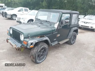 1999 Jeep Wrangler SE z VIN 1J4FY29P7XP479351, wystawiony jako IAAI lot #42797020 z przebiegiem 171 598 mil mil oraz . Historia ofert i sprzedaży dostępna na DreamBid. Obrazek 2.
