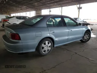 2003 Mitsubishi Galant ES z VIN 4A3AA46G53E216251, wystawiony jako Copart lot #82654014 z przebiegiem 199 493 mil mil oraz Szkoda całkowita • Salvage title. Historia ofert i sprzedaży dostępna na DreamBid. Obrazek 3.