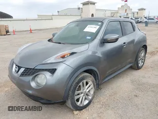 2015 Nissan Juke S with VIN JN8AF5MR8FT512769, listed as a IAAI auction lot 42102306 with 74,952 mi miles. Bid and sale history available at carsss.com. Image 2.