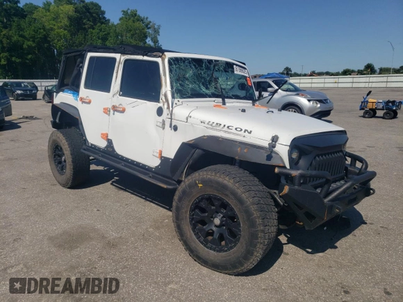 2014 Jeep Wrangler Unlimited Rubicon with VIN 1C4BJWFG4EL325544, listed as a Copart auction lot 61966025 with 149,162 mi miles and Salvage title. Bid and sale history available at DreamBid. Image 4.