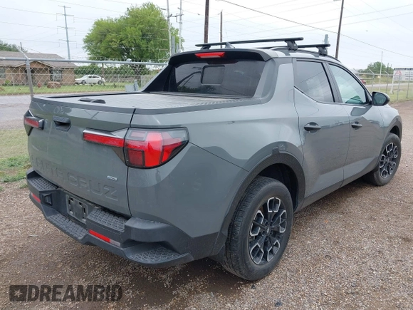2023 Hyundai Santa Cruz SEL z VIN 5NTJCDAE6PH041342, wystawiony jako IAAI lot #42192227 z przebiegiem Nie podano mil oraz . Historia ofert i sprzedaży dostępna na DreamBid. Obrazek 4.