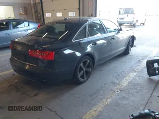 2013 Audi A6 Premium Plus z VIN WAUGFAFC6DN083752, wystawiony jako IAAI lot #41550154 z przebiegiem 151 910 mil mil oraz . Historia ofert i sprzedaży dostępna na DreamBid. Obrazek 4.