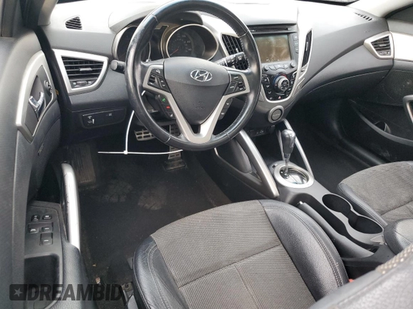 2014 Hyundai Veloster RE:FLEX z VIN KMHTC6AD2EU216453, wystawiony jako Copart lot #87090324 z przebiegiem 147 771 mil mil oraz Czysty tytuł • Clean title. Historia ofert i sprzedaży dostępna na DreamBid. Obrazek 8.