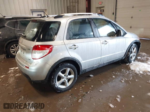 2009 Suzuki SX4 Man Touring Pkg AWD with VIN JS2YB417X95100192, listed as a IAAI auction lot 41618761 with 172,687 mi miles. Bid and sale history available at carsss.com. Image 4.
