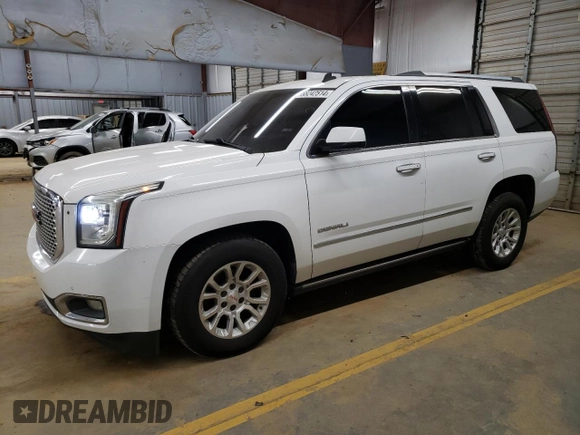 2015 GMC Yukon Denali with VIN 1GKS2CKJ1FR191804, listed as a Copart auction lot 68242514 with 250,403 mi miles and Salvage Title. Bid and sale history available at carsss.com. Image 1.