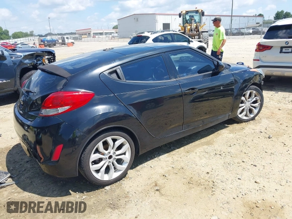2012 Hyundai Veloster w/Black Int with VIN KMHTC6AD0CU056828, listed as a IAAI auction lot 42611623 with 136,242 mi miles and . Bid and sale history available at DreamBid. Image 4.
