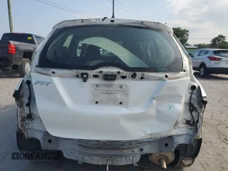 2016 Honda Fit LX с VIN JHMGK5H58GX038954, выставлен на аукционе Copart как лот 63761845 с пробегом 100 628 миль миль и Списание • Salvage title. История ставок и продаж доступна на DreamBid. Изображение 6.