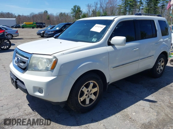 2011 Honda Pilot Touring with VIN 5FNYF4H98BB087713, listed as a IAAI auction lot 42132764 with 250,507 mi miles. Bid and sale history available at carsss.com. Image 20.
