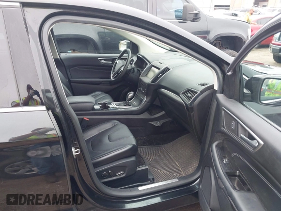2015 Ford Edge Titanium z VIN 2FMTK4K96FBB24674, wystawiony jako IAAI lot #42403892 z przebiegiem 113 816 mil mil oraz . Historia ofert i sprzedaży dostępna na DreamBid. Obrazek 5.