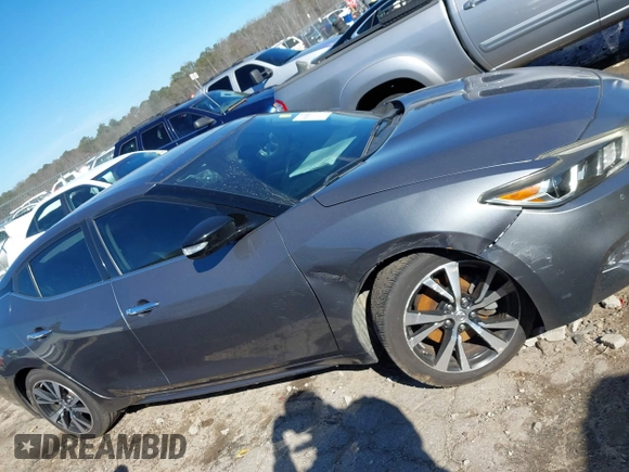 2018 Nissan Maxima SL z VIN 1N4AA6AP2JC387155, wystawiony jako IAAI lot #41642025 z przebiegiem 125 621 mil mil oraz . Historia ofert i sprzedaży dostępna na DreamBid. Obrazek 13.