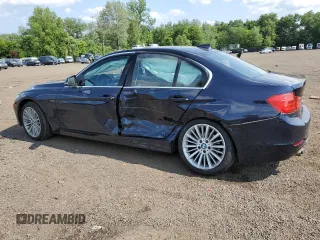 2015 BMW 3 Series 328i xDrive with VIN WBA3B5G50FNS16915, listed as a Copart auction lot 61603915 with 137,059 mi miles and Salvage title. Bid and sale history available at DreamBid. Image 2.