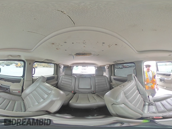 2004 Hummer H2 z VIN 5GRGN23U74H100175, wystawiony jako Copart lot #52642125 z przebiegiem 112 305 mil mil oraz Szkoda całkowita • Salvage title. Historia ofert i sprzedaży dostępna na DreamBid. Obrazek 14.