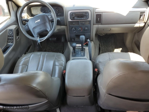 2004 Jeep Grand Cherokee Laredo with VIN 1J4GW48N84C311923, listed as a Copart auction lot 52144535 with 231,069 mi miles and Salvage Title. Bid and sale history available at carsss.com. Image 8.