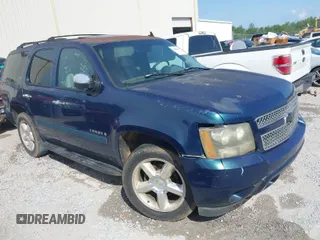 2007 Chevrolet Tahoe LT z VIN 1GNFC130X7R397300, wystawiony jako IAAI lot #41886191 z przebiegiem 332 989 mil mil oraz . Historia ofert i sprzedaży dostępna na DreamBid. Obrazek 1.
