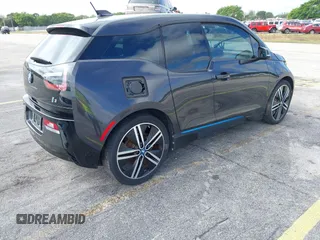 2014 BMW i3 z VIN WBY1Z4C56EVX63285, wystawiony jako IAAI lot #41672245 z przebiegiem 70 229 mil mil oraz . Historia ofert i sprzedaży dostępna na DreamBid. Obrazek 4.