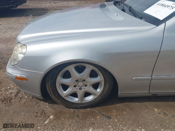 2005 Mercedes-Benz S-Class 5.0L with VIN WDBNG84J55A458443, listed as a IAAI auction lot 41804975 with 180,101 mi miles. Bid and sale history available at carsss.com. Image 6.