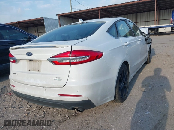 2020 Ford Fusion SE with VIN 3FA6P0HD5LR148104, listed as a IAAI auction lot 42049789 with 88,885 mi miles and . Bid and sale history available at DreamBid. Image 4.