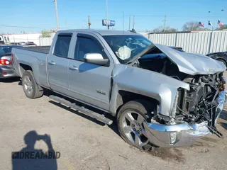 2018 Chevrolet Silverado 1500 LT with VIN 1GCRCREC0JZ212383, listed as a IAAI auction lot 41749534 with 45,777 mi miles and . Bid and sale history available at DreamBid. Image 1.