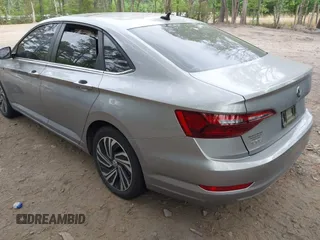 2020 Volkswagen Jetta SEL z VIN 3VWE57BU9LM082552, wystawiony jako IAAI lot #42091492 z przebiegiem 60 775 mil mil oraz . Historia ofert i sprzedaży dostępna na DreamBid. Obrazek 3.