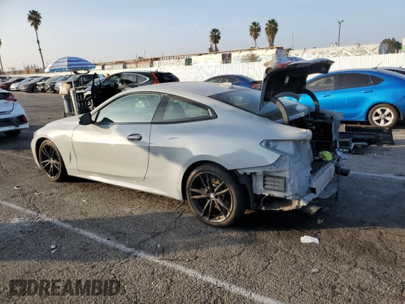 2022 BMW 4 Series 430i xDrive with VIN WBA73AP02NCK63692, listed as a Copart auction lot 84758794 with 21,484 mi miles and Salvage Title. Bid and sale history available at DreamBid. Image 2.