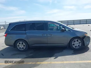 2011 Honda Odyssey EX-L with VIN 5FNRL5H69BB092752, listed as a IAAI auction lot 42245534 with 142,718 mi miles and . Bid and sale history available at DreamBid. Image 13.