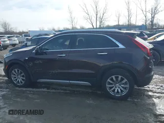 2020 Cadillac XT4 AWD Premium Luxury with VIN 1GYFZDR4XLF085471, listed as a IAAI auction lot 41528080 with 58,136 mi miles. Bid and sale history available at carsss.com. Image 14.