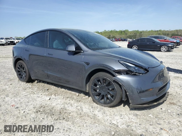 2023 Tesla Model Y Long Range z VIN 7SAYGAEE9PF662103, wystawiony jako Copart lot #51332105 z przebiegiem 35 294 mil mil oraz Szkoda całkowita • Salvage title. Historia ofert i sprzedaży dostępna na DreamBid. Obrazek 4.