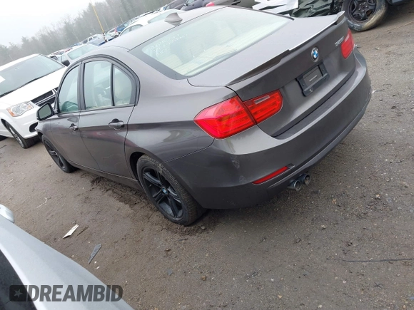 2013 BMW 3 Series 328i with VIN WBA3C1G58DNR45828, listed as a IAAI auction lot 41920757 with 122,947 mi miles. Bid and sale history available at carsss.com. Image 3.