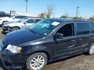 2015 Dodge Grand Caravan SXT with VIN 2C4RDGCG6FR548774, listed as a IAAI auction lot 41901232 with 141,589 mi miles and . Bid and sale history available at DreamBid. Image 6.