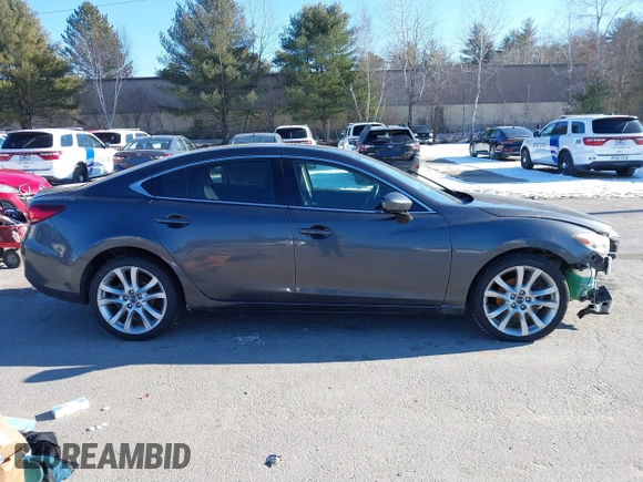 2015 Mazda 6 i Touring with VIN JM1GJ1V60F1170067, listed as a IAAI auction lot 41259559 with 131,055 mi miles and . Bid and sale history available at DreamBid. Image 12.