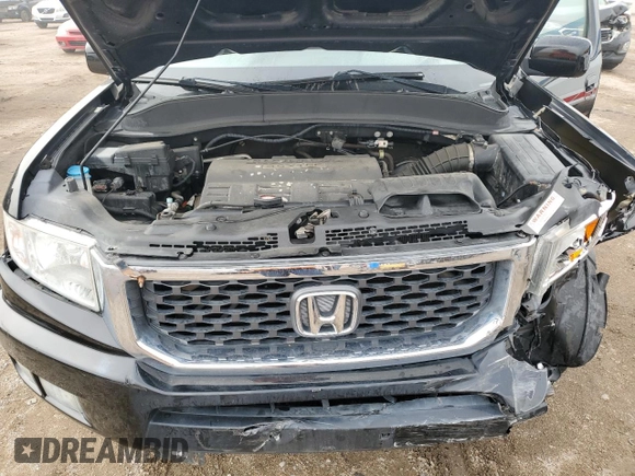 2013 Honda Ridgeline RTL z VIN 5FPYK1F5XDB004190, wystawiony jako Copart lot #58761335 z przebiegiem 56 943 mil mil oraz Czysty tytuł • Clean title. Historia ofert i sprzedaży dostępna na DreamBid. Obrazek 11.