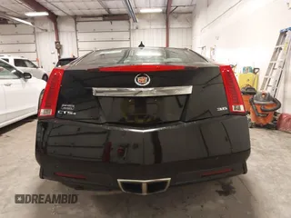 2011 Cadillac CTS Performance z VIN 1G6DL1ED3B0100075, wystawiony jako IAAI lot #41392627 z przebiegiem 124 775 mil mil oraz . Historia ofert i sprzedaży dostępna na DreamBid. Obrazek 16.