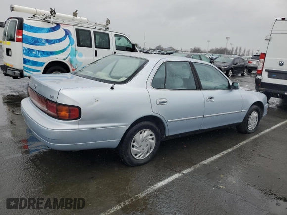 1994 Toyota Camry LE with VIN 4T1SK12E8RU411682, listed as a Copart auction lot 44153535 with 214,022 mi miles and Salvage Title. Bid and sale history available at carsss.com. Image 3.