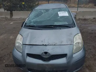 2011 Toyota Yaris with VIN JTDJT4K32B5325815, listed as a IAAI auction lot 41705028 with 137,509 mi miles. Bid and sale history available at carsss.com. Image 6.