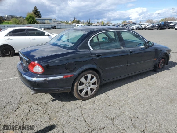 2004 Jaguar X-Type with VIN SAJEA51C74WD56736, listed as a Copart auction lot 48038295 with 115817 miles and Salvage Title. Bid and sale history available at carsss.com. Image 3.