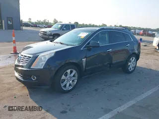 2014 Cadillac SRX Performance Collection with VIN 3GYFNFE35ES663320, listed as a IAAI auction lot 42480235 with 112,406 mi miles and . Bid and sale history available at DreamBid. Image 2.