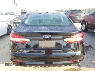 2019 Ford Fusion Hybrid SE with VIN 3FA6P0LU4KR141294, listed as a Copart auction lot 65058972 with 96,211 mi miles. Bid and sale history available at carsss.com. Image 6.