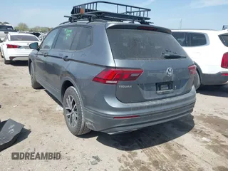 2021 Volkswagen Tiguan S with VIN 3VV1B7AX6MM027114, listed as a IAAI auction lot 41778035 with 81,075 mi miles and . Bid and sale history available at DreamBid. Image 3.