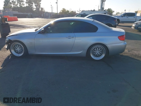 2011 BMW 3 Series 335is with VIN WBAKG1C57BE618727, listed as a IAAI auction lot 41234102 with 154,007 mi miles and . Bid and sale history available at carsss.com. Image 14.