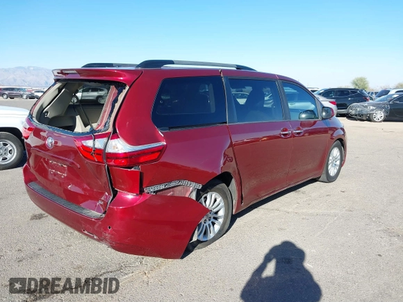 2015 Toyota Sienna XLE with VIN 5TDYK3DCXFS621190, listed as a IAAI auction lot 41646481 with 173,817 mi miles. Bid and sale history available at carsss.com. Image 4.