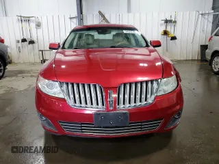 2010 Lincoln MKS z VIN 1LNHL9DR6AG614417, wystawiony jako Copart lot #54328705 z przebiegiem 124 443 mil mil oraz Szkoda całkowita • Salvage title. Historia ofert i sprzedaży dostępna na DreamBid. Obrazek 5.