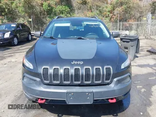 2014 Jeep Cherokee Trailhawk with VIN 1C4PJMBB6EW162303, listed as a IAAI auction lot 41910167 with 133,669 mi miles. Bid and sale history available at carsss.com. Image 13.